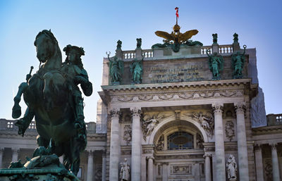 Low angle view of statue in city