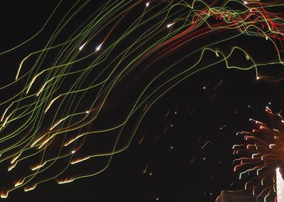 Low angle view of firework display