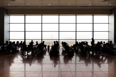 People sitting in corridor