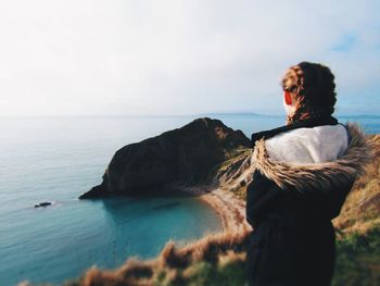 Woman looking at sea