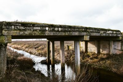 View of bridge over river against sky