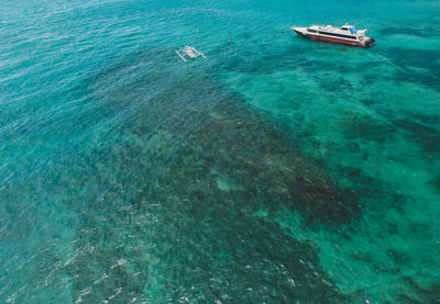 High angle view of sailboat in sea