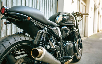 Motorcycle parked on street in city