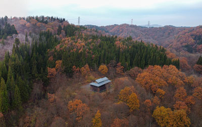 High angle view of trees and mountains against sky