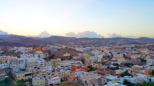 High angle view of townscape against sky during sunset