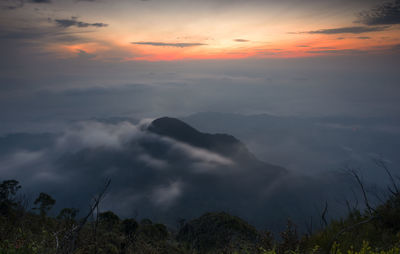 Scenic view of clouds in sky at sunset