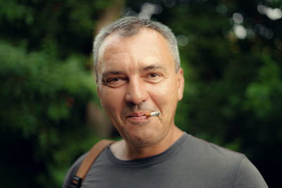 Portrait of man wearing sunglasses outdoors