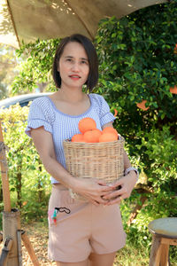 Portrait of a smiling girl holding food