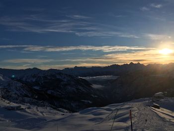 Scenic view of mountains against sky during sunset