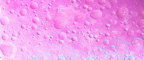 Full frame shot of wet pink bubbles
