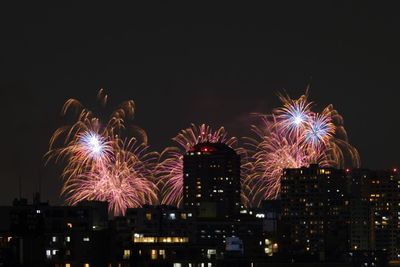 Firework display at night