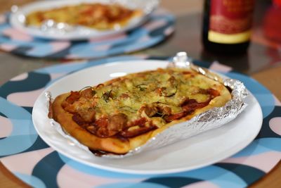 High angle view of pizza on table