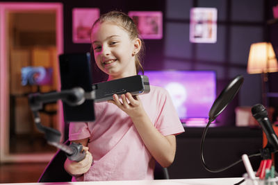 Young woman using mobile phone