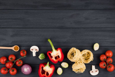 High angle view of red fruits on table