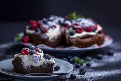 Close-up of cake in plates on table