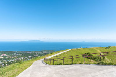 Scenic view of sea against clear blue sky
