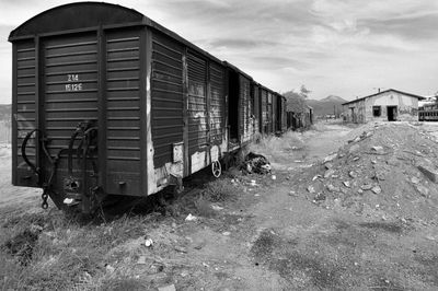 Train on railroad track against sky