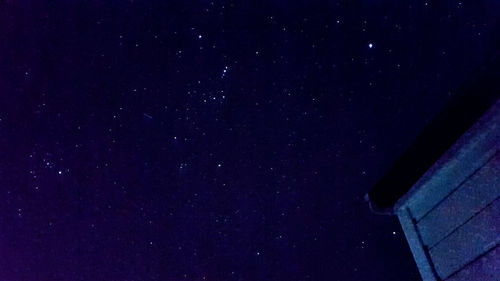 Low angle view of building against sky at night