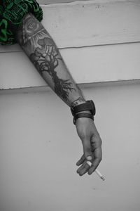 Close-up of hand with tattoo