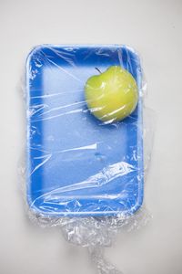 High angle view of lemon slice over white background