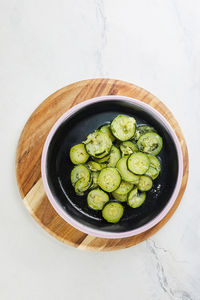 Directly above shot of food in bowl on white background