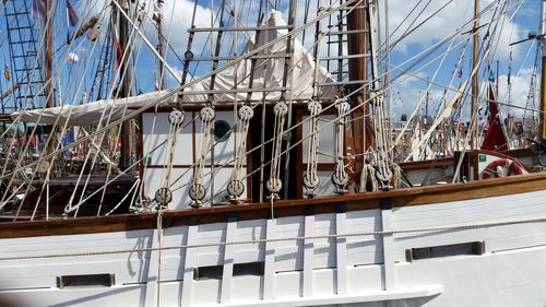 Sailboat moored at harbor