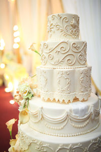 Close-up of wedding rings on table