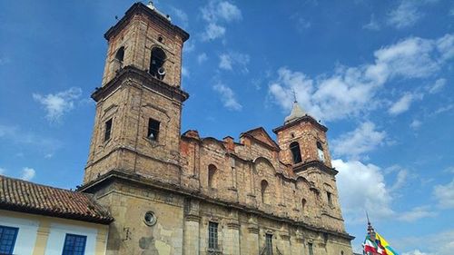 Low angle view of church against blue sky