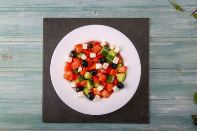 High angle view of fruits in bowl on table