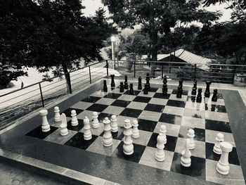 Full frame shot of chess pieces on tree in park