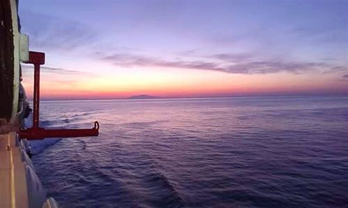 Scenic view of sea at sunset