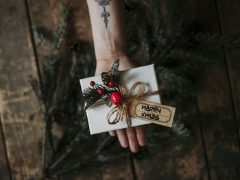 High angle view of person holding christmas decoration