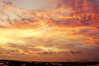 Scenic view of dramatic sky during sunset