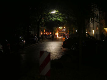 Cars on road at night