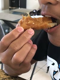 Close-up of hand holding ice cream