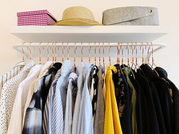 Panoramic view of clothes hanging in rack