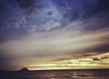 Scenic view of sea against dramatic sky