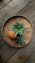 Fresh pineapple on weaving tray 