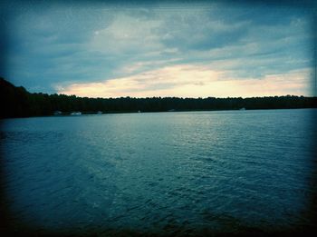 Scenic view of sea at sunset