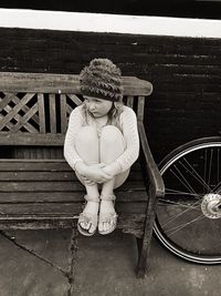 Girl sitting outdoors