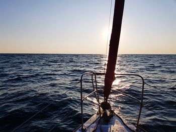 Scenic view of sea against clear sky during sunset