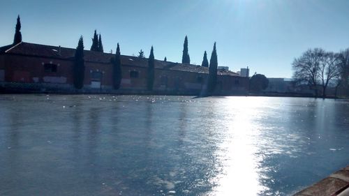 View of river with buildings in background