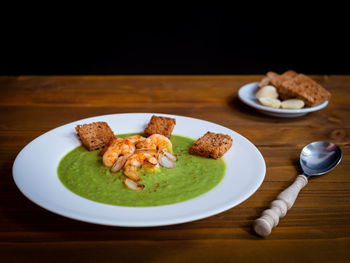 Close-up of food served on table