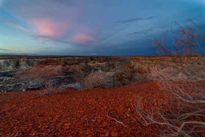 Scenic view of landscape against sky during sunset