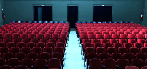 High angle view of empty chairs in stadium