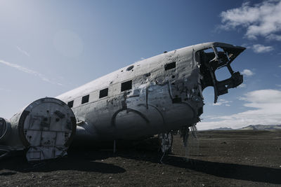 Low angle view of airplane against sky