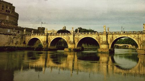 Arch bridge over river