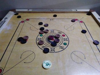 High angle view of piano on table