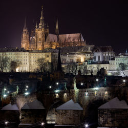 Illuminated cathedral against sky at night