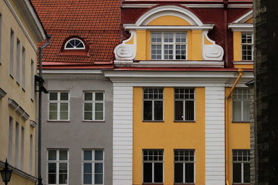 Low angle view of yellow buildings in town